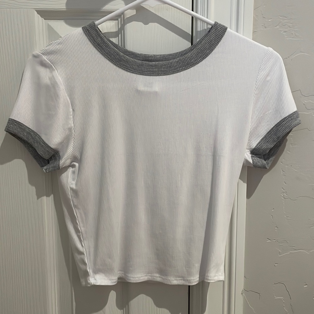 Ribbed, gray and white t-shirt. Never worn, no holes but a little see through